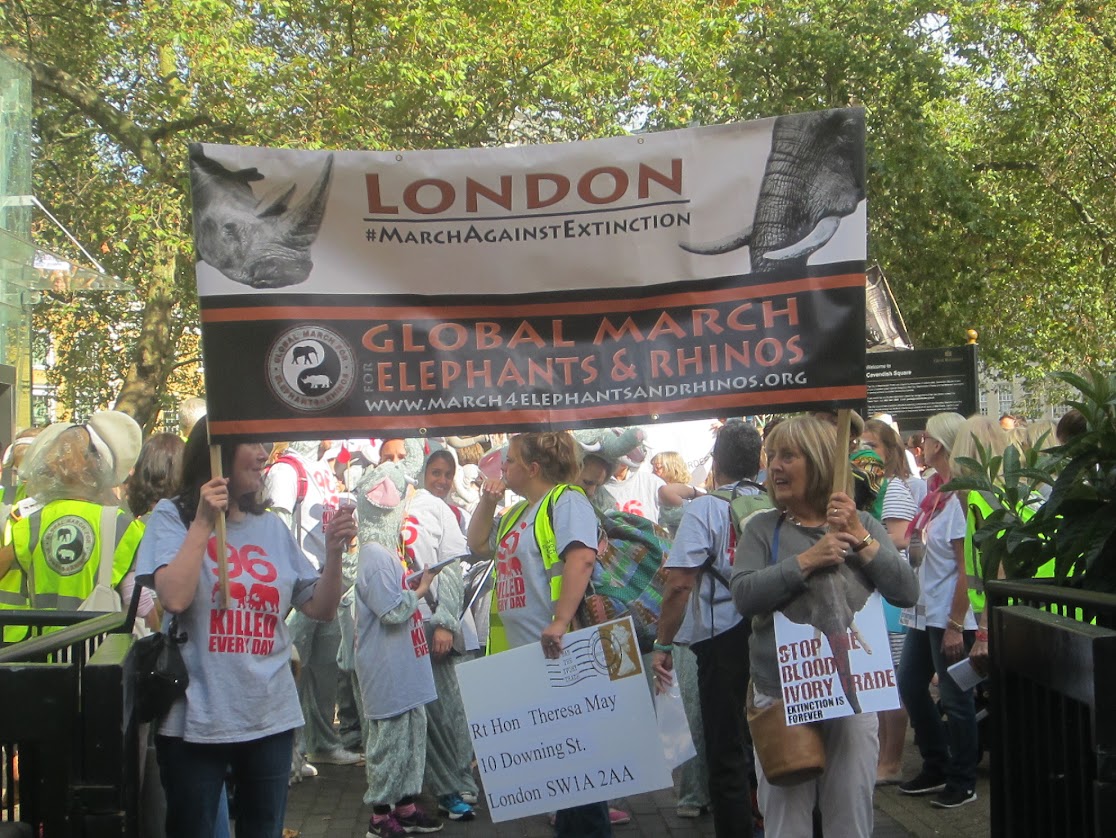 Protestors taking part in the London March Against Extinction